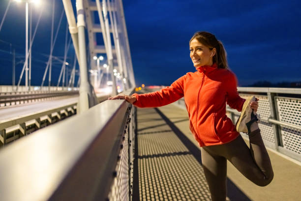 istock Caucasian woman doing leg stretching exercises for warm up 1934290619
