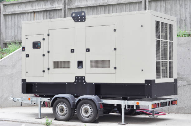 istock Industrial generator power. Mobile diesel backup generator on caravan wheels.  Backup power supply generator for emergency. 1934343239