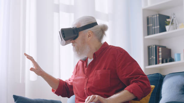 istock A man in his 60s explores new realms through virtual reality with a special VR glasses headset 1934347510