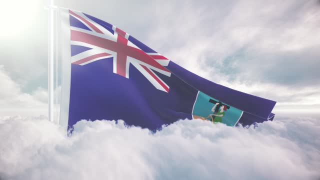 Montserrat giant flag rises above the clouds in slow motion, The concept of liberty, patriotism, independence day, celebration, patriotic, power. National flag waving proudly above the clouds and symbolizing freedom,