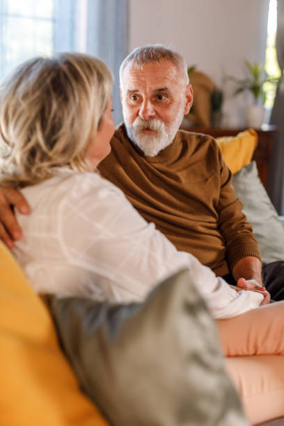 istock Romantic mature couple having bonding moments together while having a sincere conversation 1934348008