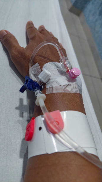 istock Receiving infusion for medical treatment 1934348039