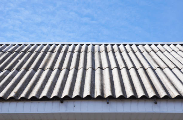 istock Asbestos roof with blue sky and copy space. 1934348105