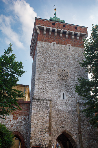A low-angle view of Saint Florians gate in the fortified walls of Krakow, Poland