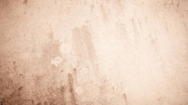 istock Mixed paper background, rough skin effect, gradient of light brown beige. 1934404206