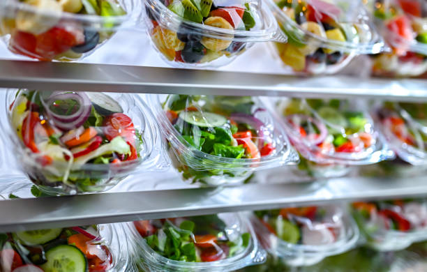 istock Boxes with fruit and vegetable salads in a commercial fridge 1934449415