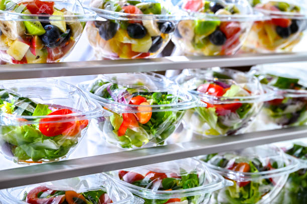 istock Boxes with fruit and vegetable salads in a commercial fridge 1934449945