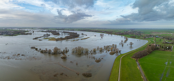 IJssel river with high water level on the floodplains of the river IJssel near the village of Zalk after a long period of heavy rain upstream in January 2023.