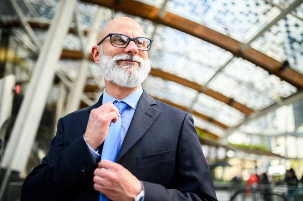 istock Confident senior businessman in urban setting 1934482674