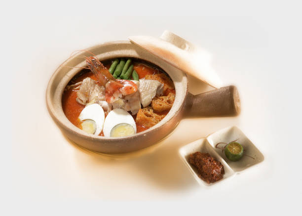 Claypot curry laksa noodles with seafood and chicken