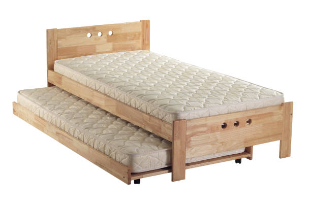 Wooden frame pull out bed with mattress Wooden frame pull out bed with mattress Automotive Structural Sheet stock pictures, royalty-free photos & images