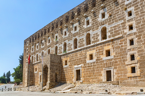 Exterior facade of the restored skene of Roman theatre of ancient city Aspendos. Serik, Antalya, Turkey