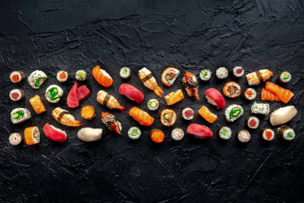 istock Sushi. An assortment of rolls, maki, nigiri etc, overhead flat lay composition 1934522599