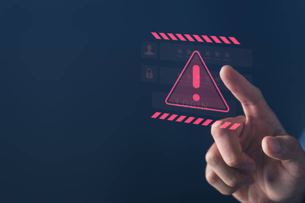 istock Businessman pointing download button with red warning alert system hacked screen. System alert for virus,spam,scam and phishing. Cyber security, data security system concept. 1934524759