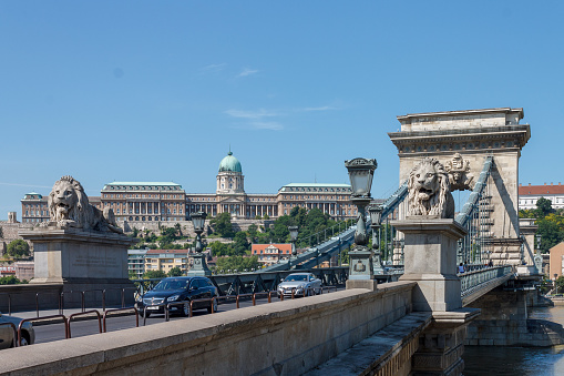 The beautiful palace with a huge dome on the Buda hill, Buda Castle and the chain bridge\nBudapest, Hungary