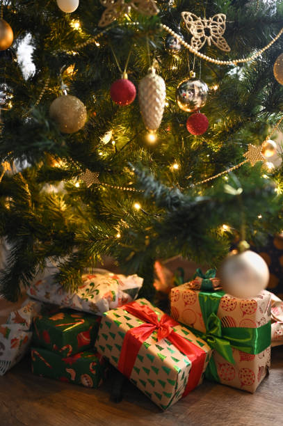 istock Gifts under the Christmas tree. Christmas decorations. 1934542650
