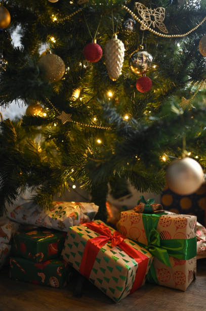 istock Gifts under the Christmas tree. Christmas decorations. 1934542651