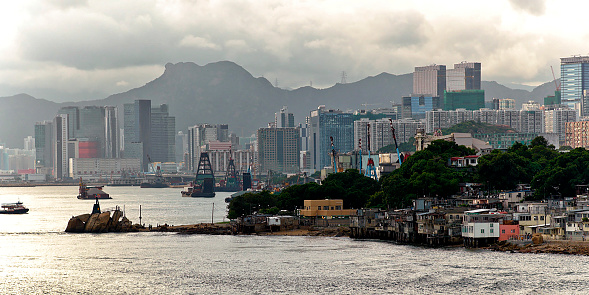 Lei Yue Mun is a short channel in Hong Kong. It lies between Junk Bay and Victoria Harbour, separating Kowloon and Hong Kong Island. The channel is an important passage for the city, forming the eastern entrance of Victoria Harbour. The lands around the channel are also called Lei Yue Mun. On Kowloon side, it is famous for its seafood market and restaurants in the fishing villages.