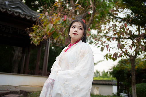 young woman wearing white hanfu