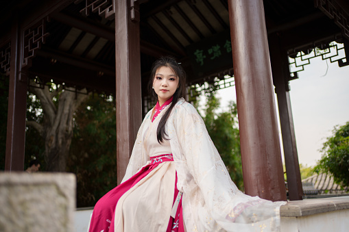young woman wearing white hanfu