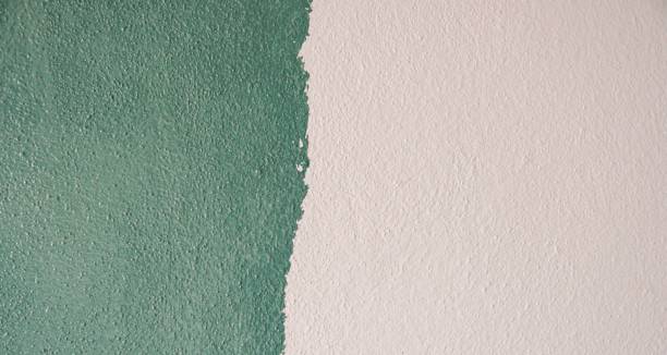 istock Half painted color wall by paint brush 1934632808