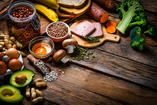 istock Group of food with high content of biotin (vitamin B7) on rustic table 1934637552