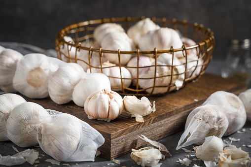 fresh garlic on a wooden table
