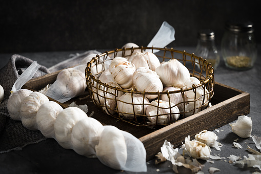 fresh garlic on a wooden table