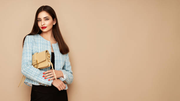 istock Young brunette woman in blue jacket 1934638088