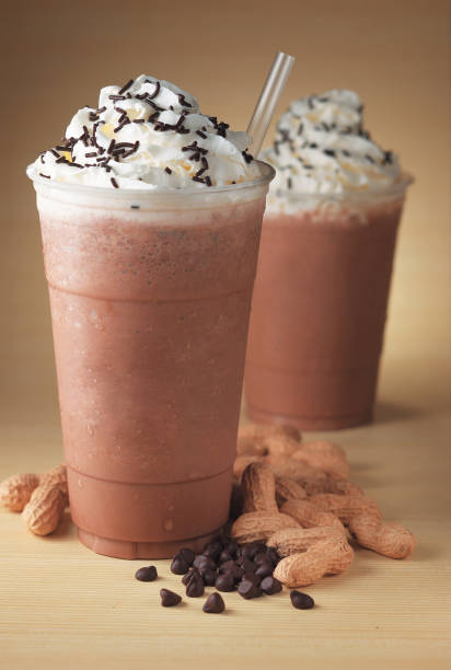 istock Iced frappuccino with peanut flavour covered with whipped cream 1934639190