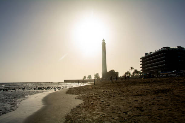 istock Lighthouse in Maspalomas, Gran Canaria, Spain at sunset with beach 1934641354