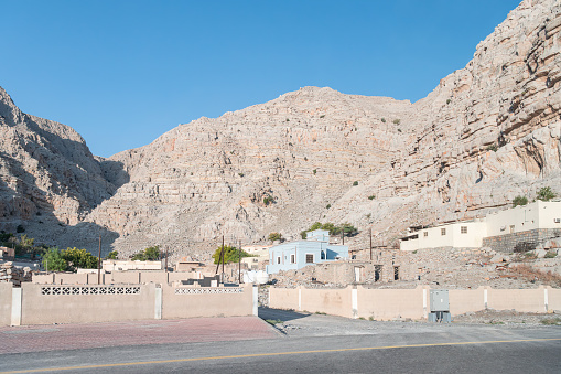 Small development of housing in the desert , Musandam, Oman - Nov