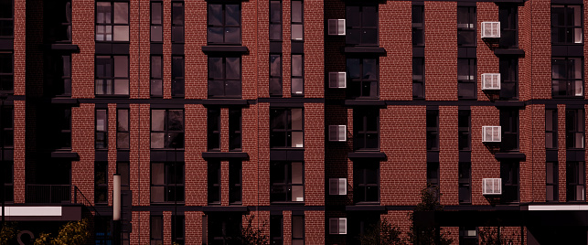 facade of the building. geometric patterns from windows. modern multi-storey residential building