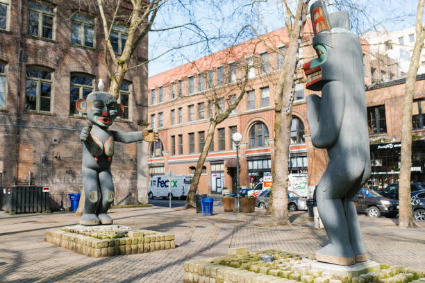 the indian statue in pioneer square in seattle - kwakiutl ストックフォトと画像