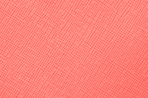 Peach Coral color of leather texture, background, surface, copy space