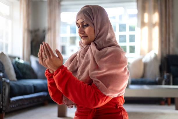istock Person Praying Alone at Home 1934788420