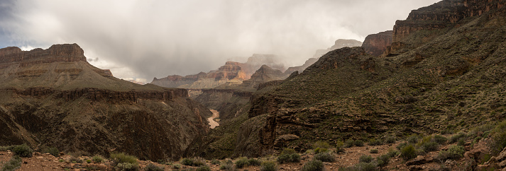 Panorama of Clouds Wafting in and out of Canyon Arms on early spring day