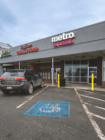 Rome, NY - Dec 17, 2023: Metro by T-Mobile is a US prepaid virtual wireless service provider and brand owned by T-Mobile, formerly known as MetroPCS and changed its name to Metro by T-Mobile in 2018.