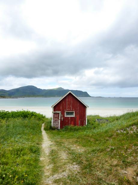 istock Red Cabin Retreat: Seclusion by the Sea 1934823883
