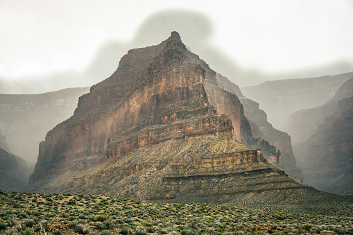 Vesta Temple Juts into Thick Fog Along the Tonto Plateau in the Grand Canyon