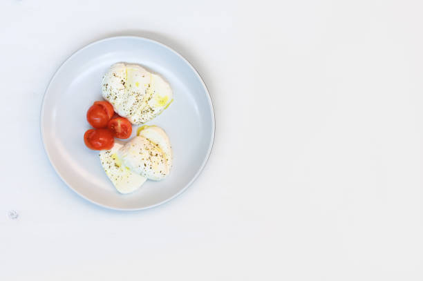 Caprese salad on a white background.