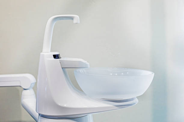 istock faucet with bowl for rinsing teeth in dental office 1934897527