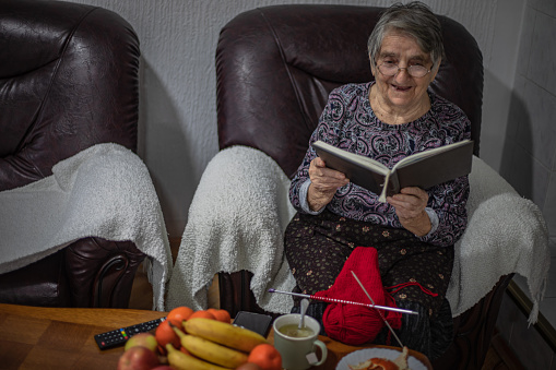 Senior woman reading a book