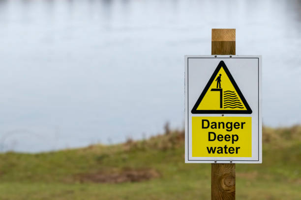 istock Danger Deep Water sign on a wooden post 1934911140