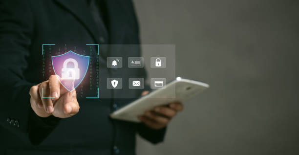 istock Businessman touches virtual screen on padlock and shield icon to prevent online data theft. Internet security concept. Protecting privacy from hacker data theft. Identity safety from virus phishing. 1934935304