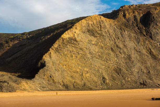 Dramatic cliffs at Cordoama Beach in Algarve, Portugal