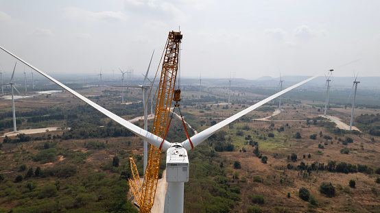 Windmill Installation or Wind Turbine maintenance service by power crane