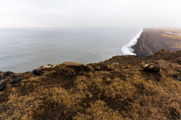 Dyrhólaey nature reserve black sand beach in Iceland stock photo