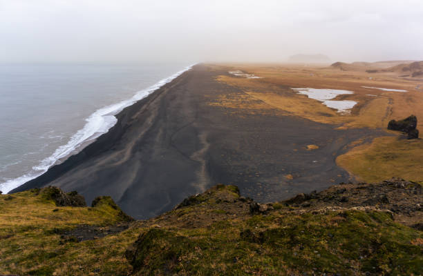 Dyrhólaey nature reserve black sand beach in Iceland stock photo