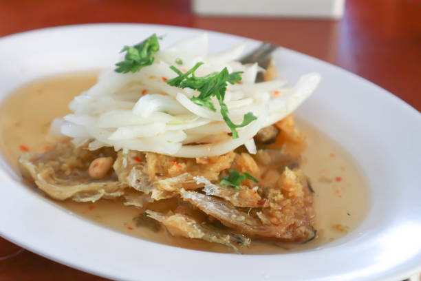 fish salad or fried fish ,deep fried fish or spicy fried fish salad or spicy fish salad